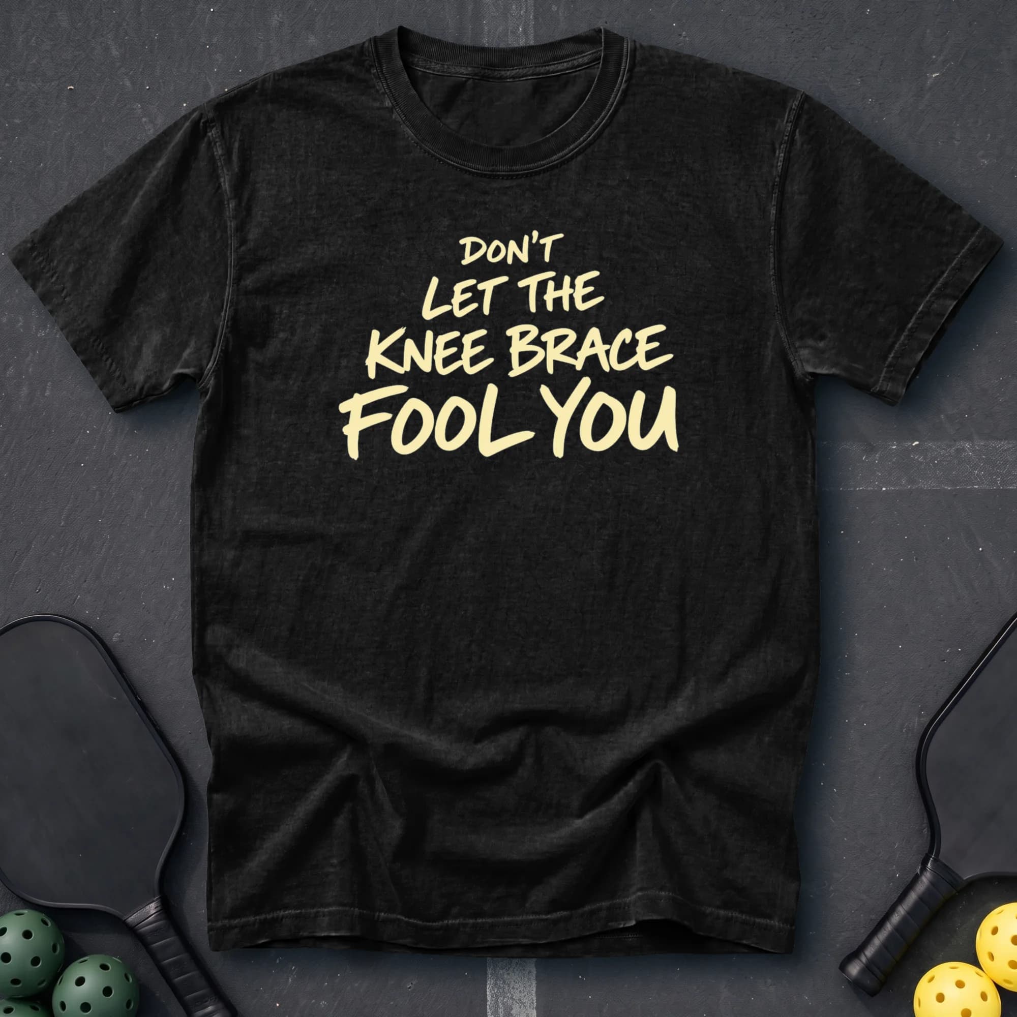 Don't Let The Knee Brace Fool You Tee in Black pickleball t-shirt
